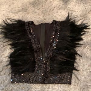 Black feather and sequin vest.